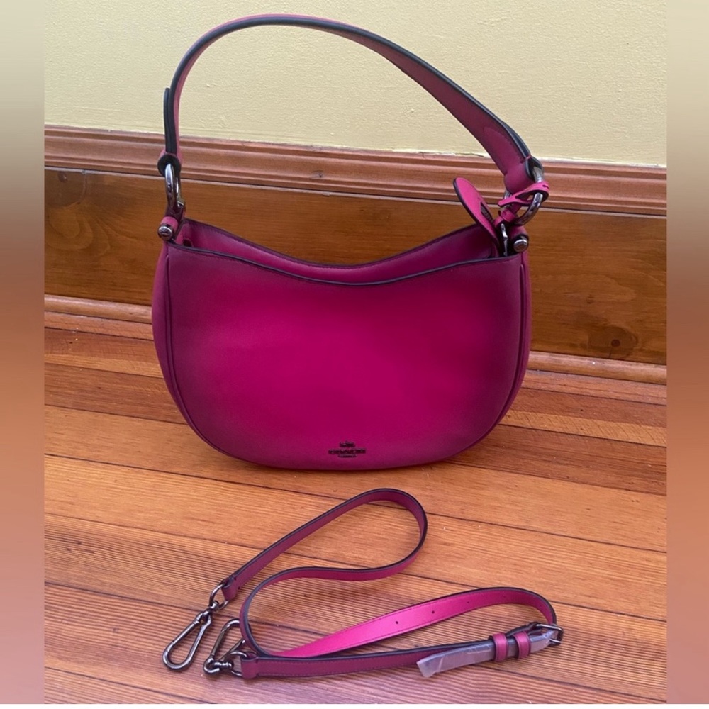 NWOT Coach glovetanned leather Nomad
Mae hobo